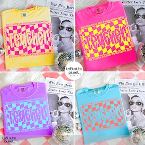 May include: Four colorful t-shirts, yellow, pink, purple, and blue, each with a large "Teacher" graphic in a checkered pattern. The text "Teach Them, Love Them, Watch Them Grow" surrounds the graphic. A newspaper and disco ball are in the background.