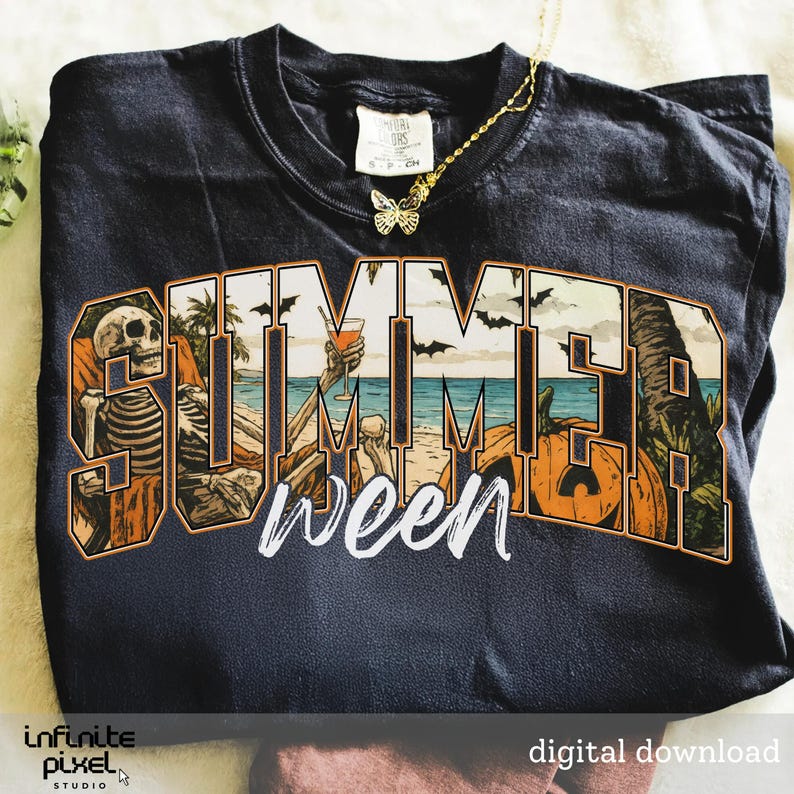 May include: Black t-shirt with a graphic design featuring the words "Summerween" in a stylized font. The design includes a skeleton on a beach, a cocktail, bats, and a pumpkin. A gold butterfly necklace is visible.
