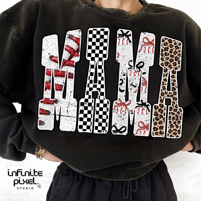 May include: Black sweatshirt featuring the word "MAMA" in large, distressed white letters. The letters are decorated with baseballs, bows, a checkered pattern, and leopard print. The sweatshirt is worn by a person.