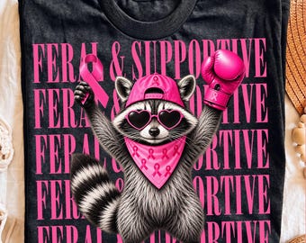 Feral And Supportive Raccoon PNG | Breast Cancer Awareness Tee | Pink Ribbon Design | Strong Women & Supporters Gift