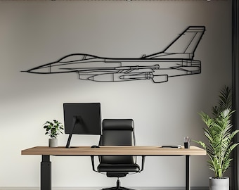 May include: A black metal wall art piece shaped like a fighter jet silhouette. The design features the distinct profile of a military aircraft, including the cockpit, wings, tail fin, and under-wing armaments, rendered in a flat, minimalist line style.