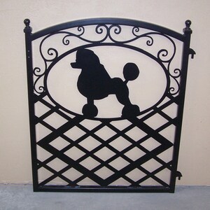 Black gate with metal art poodle