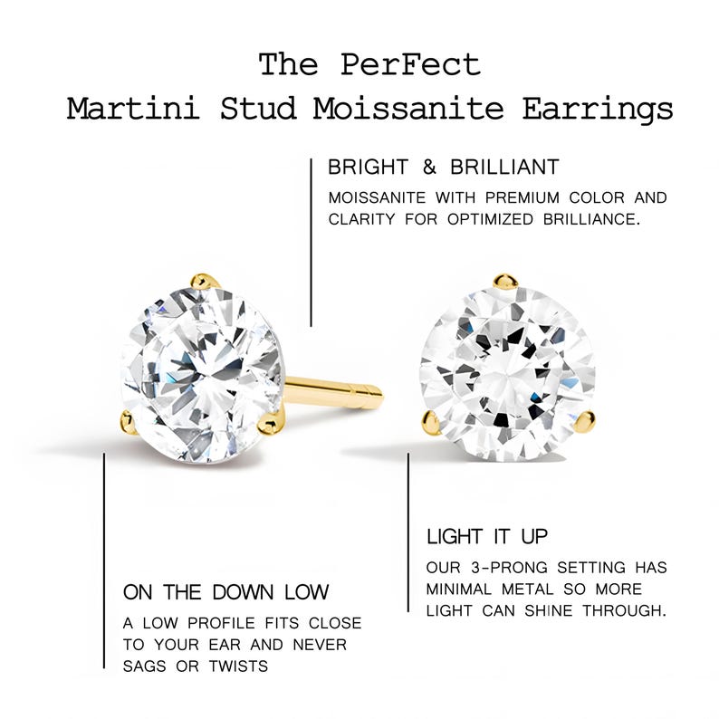 May include: Two Martini stud moissanite earrings with a bright and brilliant design. The earrings have a 3-prong setting with minimal metal. The text on the image says "The Perfect Martini Stud Moissanite Earrings".