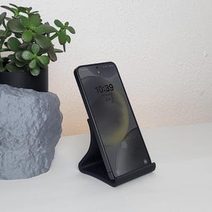 Minimalist cell phone holder