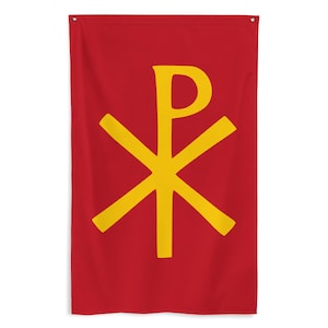 May include: A red flag featuring a yellow Chi Rho symbol. The Chi Rho is a monogram of the first two letters of the Greek word for Christ. The flag is rectangular with grommets at the top for hanging.