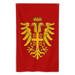 May include: A red wall flag featuring a gold double-headed eagle with a crown, wings spread, and a shield with a cross and four 'C' symbols. The flag is rectangular with grommets at the top corners.