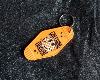 Chaveiro Cafeine Queen Retro Motel: Rosto Sorridente Relâmpago