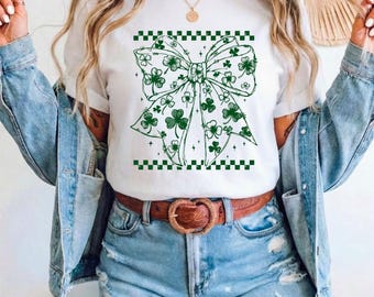 Camiseta com laço para o Dia de São Patrício, camiseta com estampa de trevo Coquette