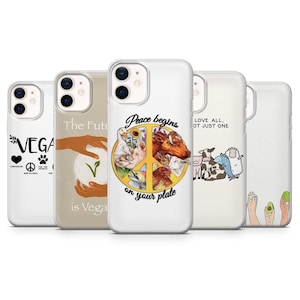 May include: Four different phone cases with vegan-themed designs. The first case features the word "VEGAN" with a peace sign and a heart. The second case has the text "The Future is Vegan" with a hand holding a plant. The third case has a peace sign with the text "Peace begins on your plate" and features a variety of animals. The fourth case has the text "Love All. Not Just One" with a variety of animals.