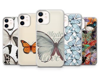 May include: Four different iPhone cases with butterfly designs. The cases are clear and show the phone's design. One case has a blue butterfly with the text "Made for Love". Another case has a colorful butterfly with a floral design. The third case has a blue butterfly with a floral design. The fourth case has a blue butterfly with a floral design.