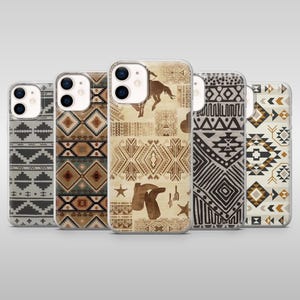 May include: Five phone cases with Southwestern patterns in shades of brown, grey, and beige. One case features a cowboy and horse graphic. The cases are made of clear plastic.