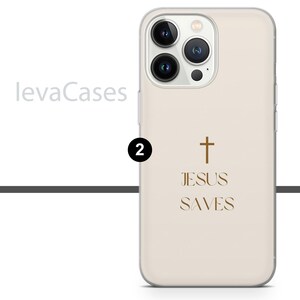 May include: A white iPhone case with a clear back. The case has a gold cross and the text "JESUS SAVES" printed on the back.
