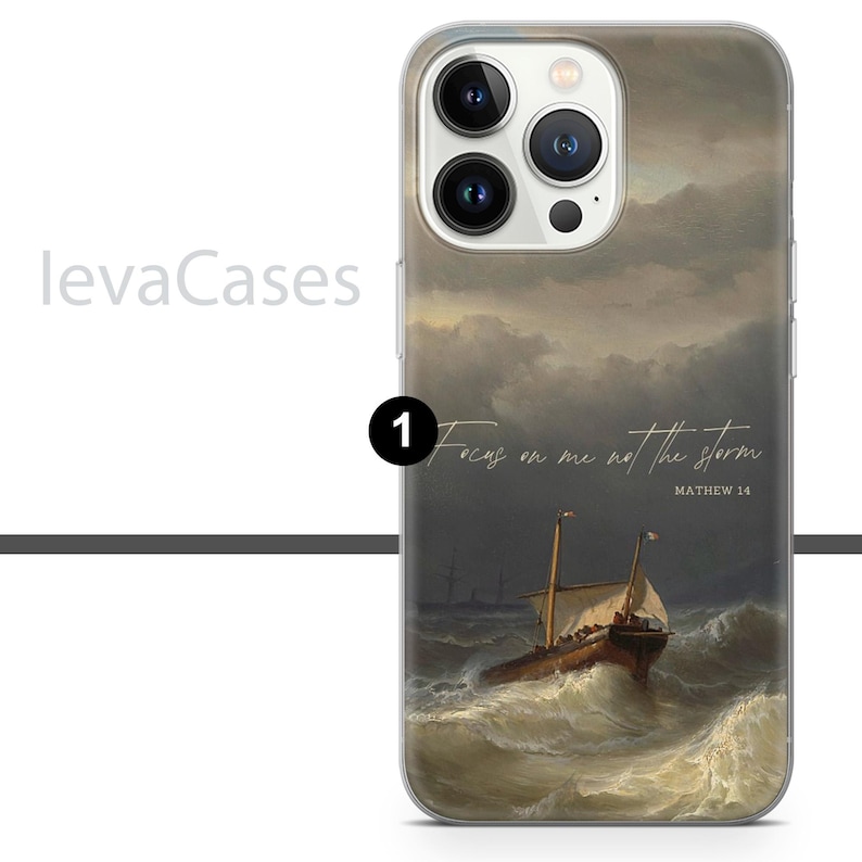 May include: A clear phone case with a painting of a ship sailing through a stormy sea. The text "Focus on me not the storm" and "Matthew 14" are printed on the case.