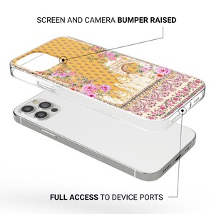 May include: A clear phone case with a floral pattern. The case has a yellow background with pink flowers and a decorative border. The text "SCREEN AND CAMERA BUMPER RAISED" and "FULL ACCESS TO DEVICE PORTS" are visible.