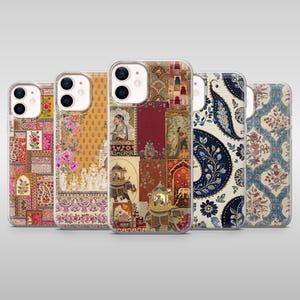 May include: A collection of five phone cases with various colorful, patterned designs. The cases feature floral, paisley, and patchwork motifs in shades of red, yellow, blue, and green. Each case has a clear border.