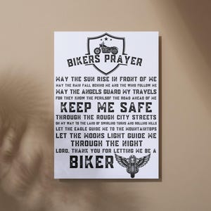 May include: Black and white print with a biker's prayer. The text reads "Bikers Prayer" and includes a motorcycle graphic. The prayer reads "May the sun rise in front of me...Lord, thank you for letting me be a biker."