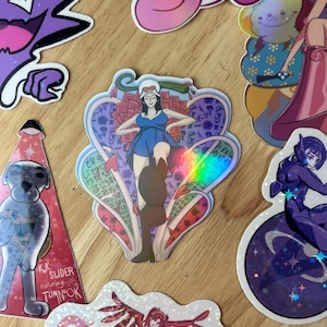 Dressrosa Nico Robin Holographic Sticker - Hand Drawn One Piece Inspired Art - 2.2in x 2.6in - Water Resistant Laminated Vinyl