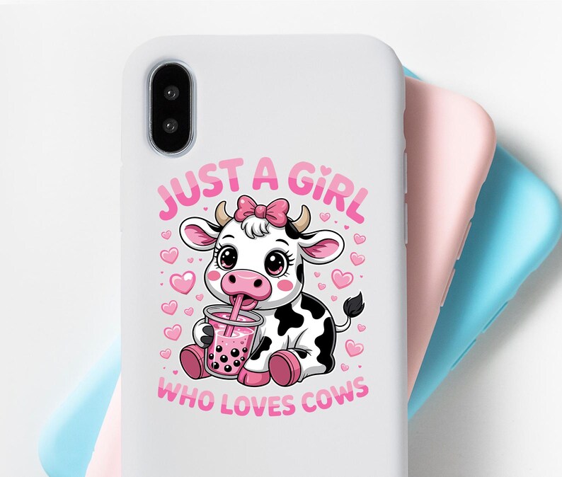 May include: White phone case with a cartoon cow design. The cow has a pink bow and is drinking boba tea. Pink text reads "JUST A GIRL WHO LOVES COWS". Pink hearts are scattered around the cow.