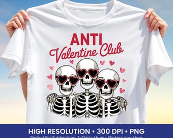 May include: White t-shirt featuring a graphic of three skeletons with heart-shaped sunglasses, surrounded by hearts. The text "ANTI Valentine Club" is displayed in red. The shirt is held up against a blue sky background.