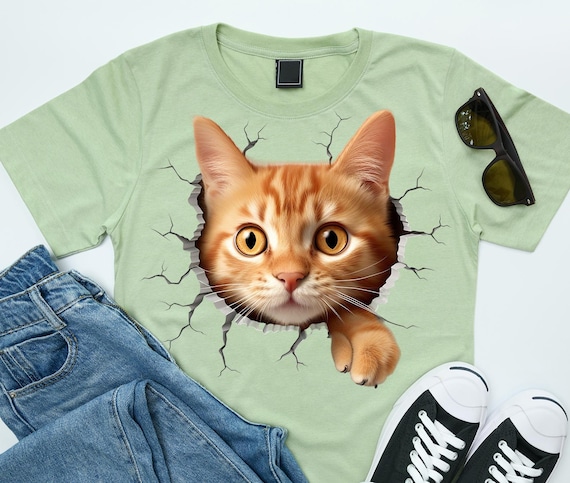 3D Orange Cat T-shirt Design PNG – Realistic Kitten Breaking Wall