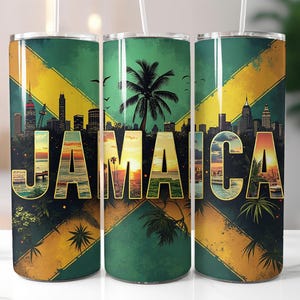 May include: A set of three insulated tumblers with a vibrant design featuring the word "JAMAICA" in large, colorful letters. The design incorporates a cityscape, palm trees, and the colors of the Jamaican flag: green, yellow, and black.