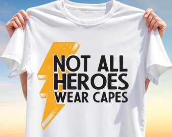 Not All Heroes Wear Capes T-Shirt PNG – Bold Lightning Bolt T-Shirt Design, Motivational Sublimation Graphic for Everyday Real-Life Heroes