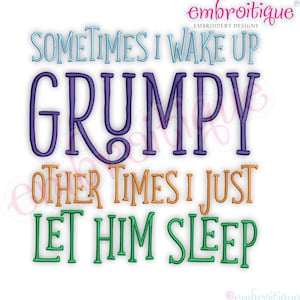 May include: Embroidered design featuring the text "Sometimes I wake up grumpy, other times I just let him sleep". The text is in various colours, including purple, orange, green, and blue.