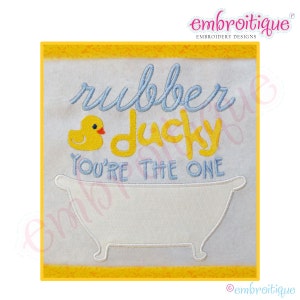 May include: A white embroidery design with a yellow rubber ducky, a blue bathtub, and the text "rubber ducky you're the one".