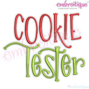 May include: Embroidered design with the text "Cookie Tester" in red and green lettering. The word "Cookie" is in red and the word "Tester" is in green.