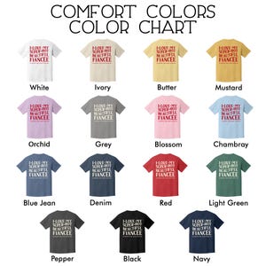 May include: A color chart displays various Comfort Colors t-shirts. Each shirt features the text "I LOVE MY SUPER-HOT BEAUTIFUL FIANC&Eacute;E" in red. Colors include white, ivory, butter, mustard, orchid, grey, blossom, chambray, blue jean, denim, red, light green, pepper, black, and navy.