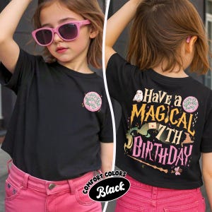 May include: Black t-shirt with a round graphic that says "Happee Birthdae Barry" on the front. The back of the shirt says "Have a Magical 7th Birthday" with a wizard theme. The shirt is paired with pink pants.