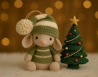 May include: A crocheted bunny doll wearing a green and white striped hat and sweater, with a matching pom-pom. Beside it is a crocheted Christmas tree decorated with gold beads, red ornaments, and a gold star.