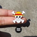 One Piece Enamel Pin: Straw Hat Jolly Roger Chibi Badge product logo