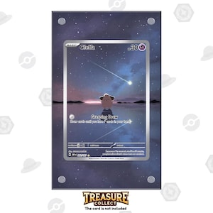 May include: A framed Cleffa Pokémon card with a starry night background. The card features a Cleffa illustration and the text "Grasping Draw". The frame is clear with silver hardware. The text "TREASURE COLLECT" is at the bottom.