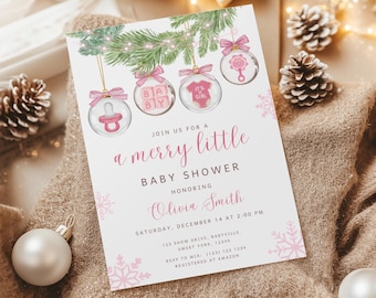 May include: A rectangular baby shower invitation card featuring a green pine branch with four hanging glass ornaments containing a pink pacifier, baby blocks, a onesie, and a rattle. The text reads: JOIN US FOR A merry little BABY SHOWER HONORING Olivia Smith SATURDAY, DECEMBER 14 AT 2:00 PM 123 SNOW DRIVE, BABYVILLE, SWEET YORK, 12345 RSVP TO MIA: (123) 123 1234 REGISTERED AT AMAZON.