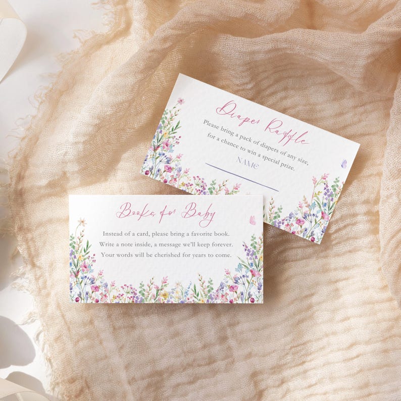 May include: Two baby shower invitation cards with floral borders. One card reads "Diaper Raffle" and the other says "Books for Baby." Both cards have space for a name or message and are decorated with watercolor flowers.