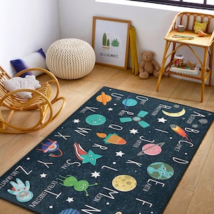 Space Adventure Rug Kids outer space play mat with planets, stars, and rockets. Soft, durable, perfect for imaginative play