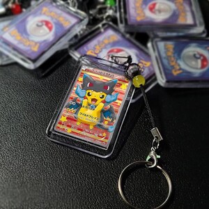 Pikachu avec poncho - Mega Charizard X #207/XY-P Pokemon japonais Promo | PORTE-CLÉS