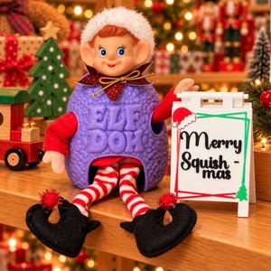 May include: A doll with a white fuzzy hat, red sleeves, and red and white striped legs wearing black shoes with red pom-poms. The doll is inside a purple textured shell with the text ELF DOH embossed on the front. Next to it is a white sign with the text Merry Squish-mas.