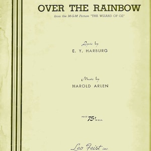 May include: A vintage sheet music cover for the song "Over the Rainbow" from the M-G-M Picture "The Wizard of Oz". The cover is yellowed with age and features the song title in bold, black letters. The composers, E. Y. Harburg and Harold Arlen, are listed below the title. The price is listed as 75 cents in U.S.A. The publisher, Leo Feist Inc., is listed at the bottom with their address.