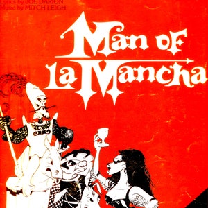 May include: A vintage book cover for "Man of La Mancha" with a vibrant red background. The title is in bold white lettering, with illustrations of characters from the musical. The cover also includes the text "The Impossible Dream" and "Cherry Lane Standard."