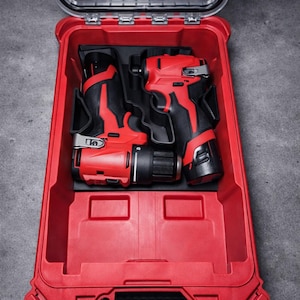 May include: Red and black cordless drill and driver set in a red plastic storage case. The case has a clear lid and is open, revealing the tools in their molded compartments. The tools have black handles and red accents.