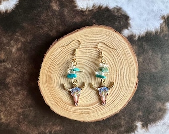 Ossenkophanger kralenoorbellen (blauwe madeliefjes)