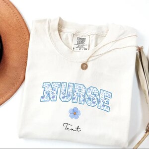 Custom Nurse Blue Comfort Color Tee, Unisex T-shirt, Garment-Dyed Shirt, Floral Print Top, Botanical Graphic Tee, Hand-Dyed Cotton Tee