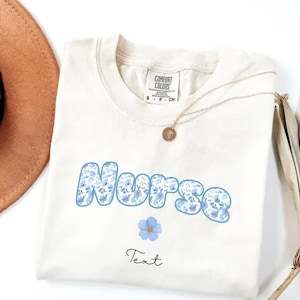 Cute Custom Nurse Blue Comfort Color Tee, Unisex T-shirt, Garment-Dyed Shirt, Floral Print Top, Botanical Graphic Tee, Cotton Tee