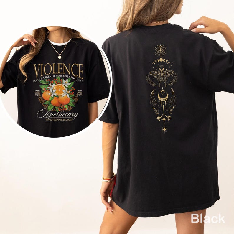 May include: Black t-shirt with a front graphic featuring the word "VIOLENCE" above "Apothecary" and an orange and floral design. The back of the shirt has a gold-colored moth and celestial design. The shirt is oversized.
