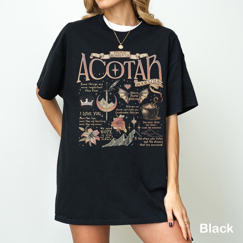 May include: Black t-shirt with the text "ACOTAR BOOKS CLUB" in a vintage style. The shirt features various illustrations, including a crown, flowers, and mountains. The text "I LOVE YOU" is also visible. The shirt is a comfortable, casual wear item.