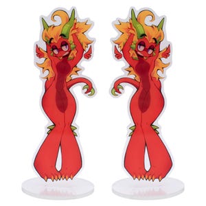 May include: Two acrylic standees featuring a cartoon dragon character. The dragons are red with yellow and orange hair, green horns, and purple eyes. Each standee is on a clear, circular base.