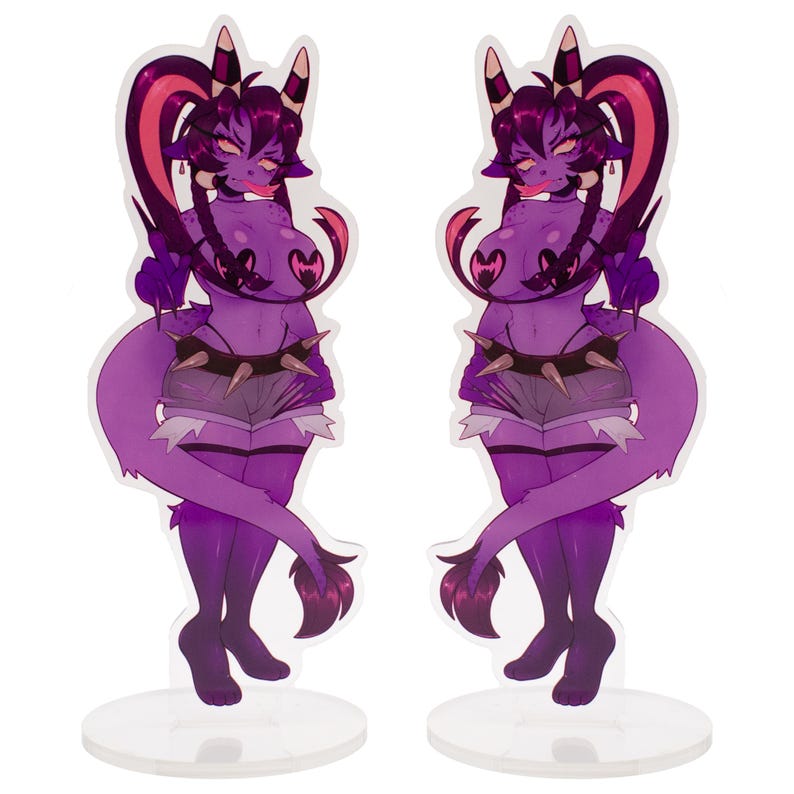 May include: Two purple cartoon figures with horns, a spiked collar, and shorts. The figures have a tail and are standing on clear circular bases. The figures are in a suggestive pose.