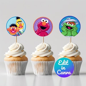 May include: Three cupcakes with white frosting topped with round edible images of Sesame Street characters. The characters are Elmo, Big Bird, and Oscar the Grouch. The cupcakes are on a white surface. Edit in Canva.